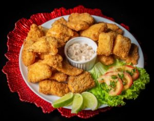 Alligator Nuggets on Red and White Ceramic Plate
