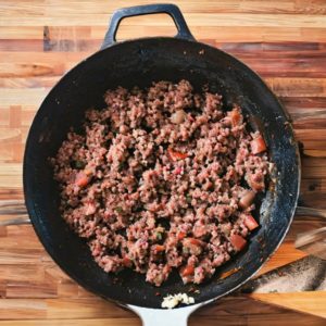 Pan of cooked Sausage and Ground Beef